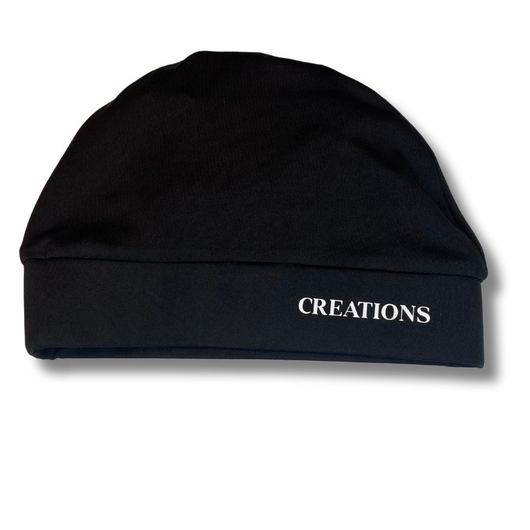 Black beanie with 'CREATIONS' text on a white background