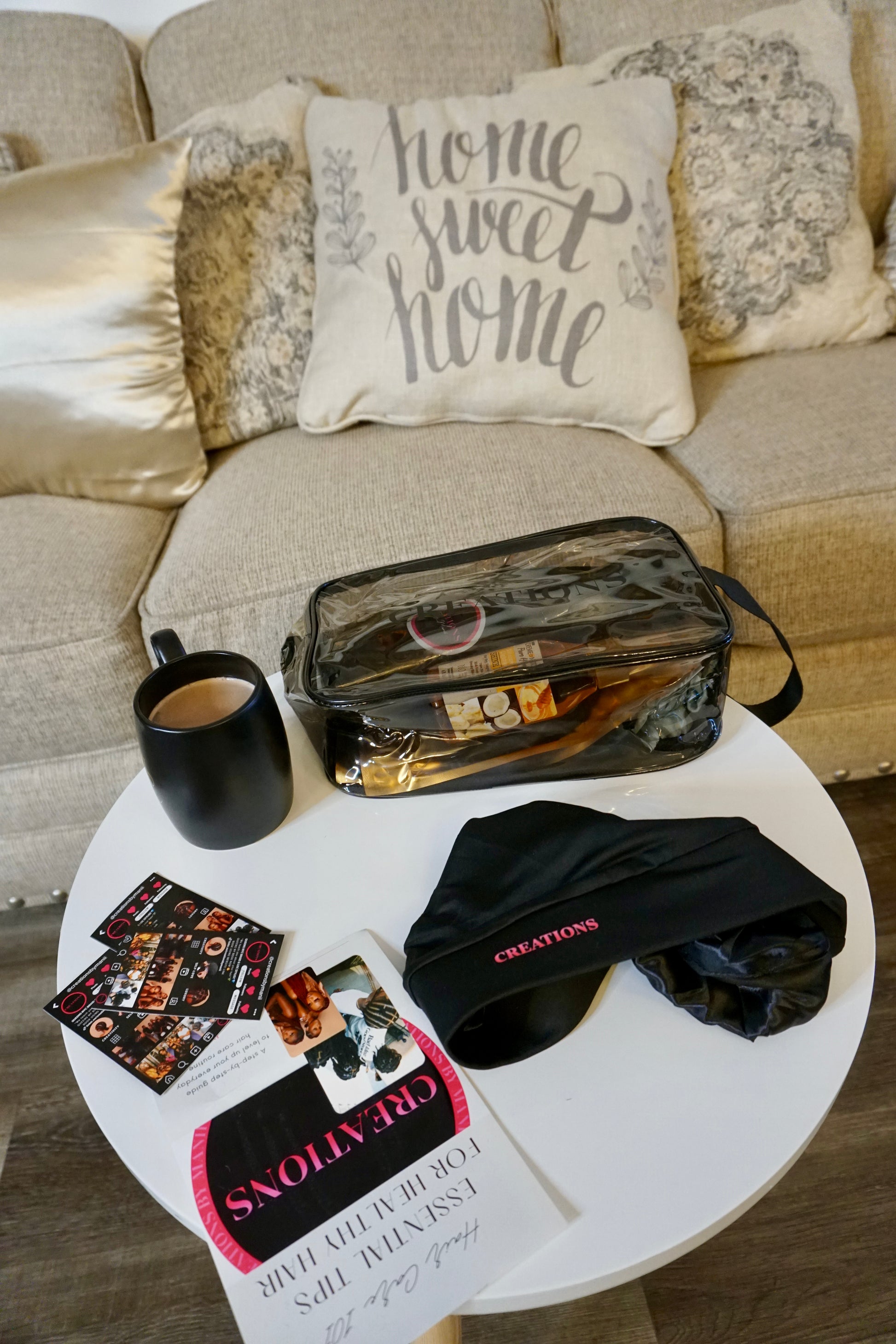 A black and clear bag, that stores your own hair care products.
